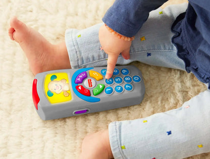 📺 Fisher-Price Ríe y Aprende: Control Remoto de Perrito - Juguete Educativo para Bebés 🎶